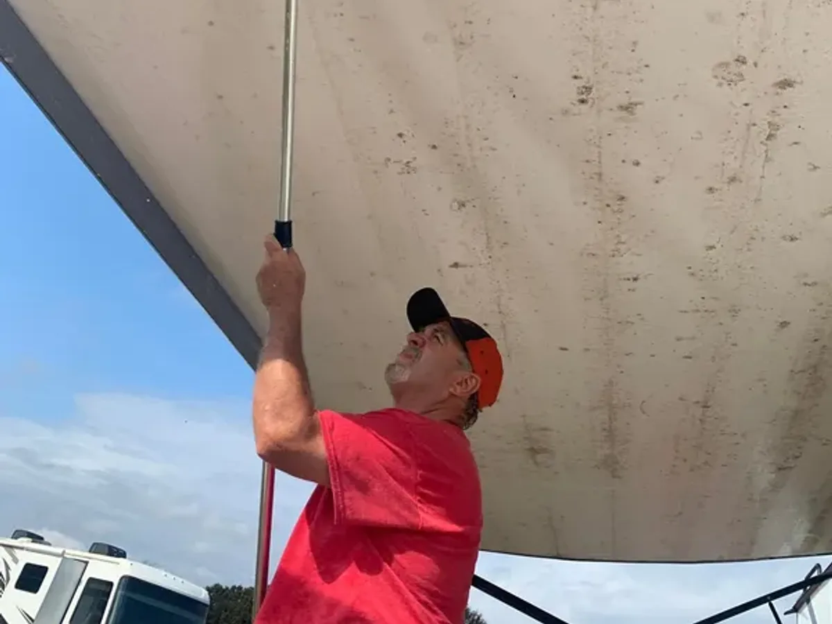 RV awning cleaning in progress