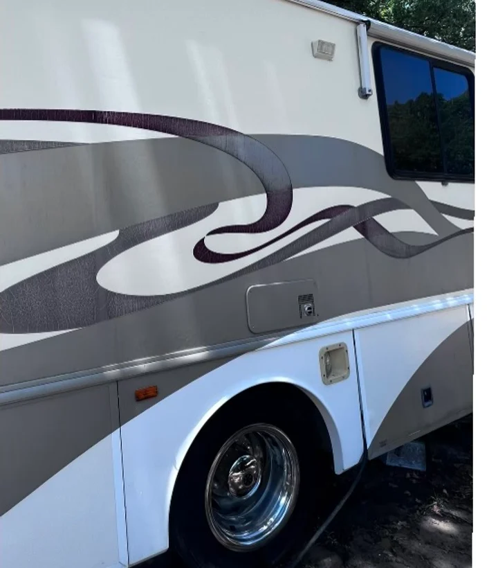 After RV exterior cleaning side panel