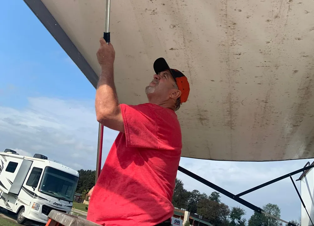 Mobile RV Detailers cleaning an RV awning